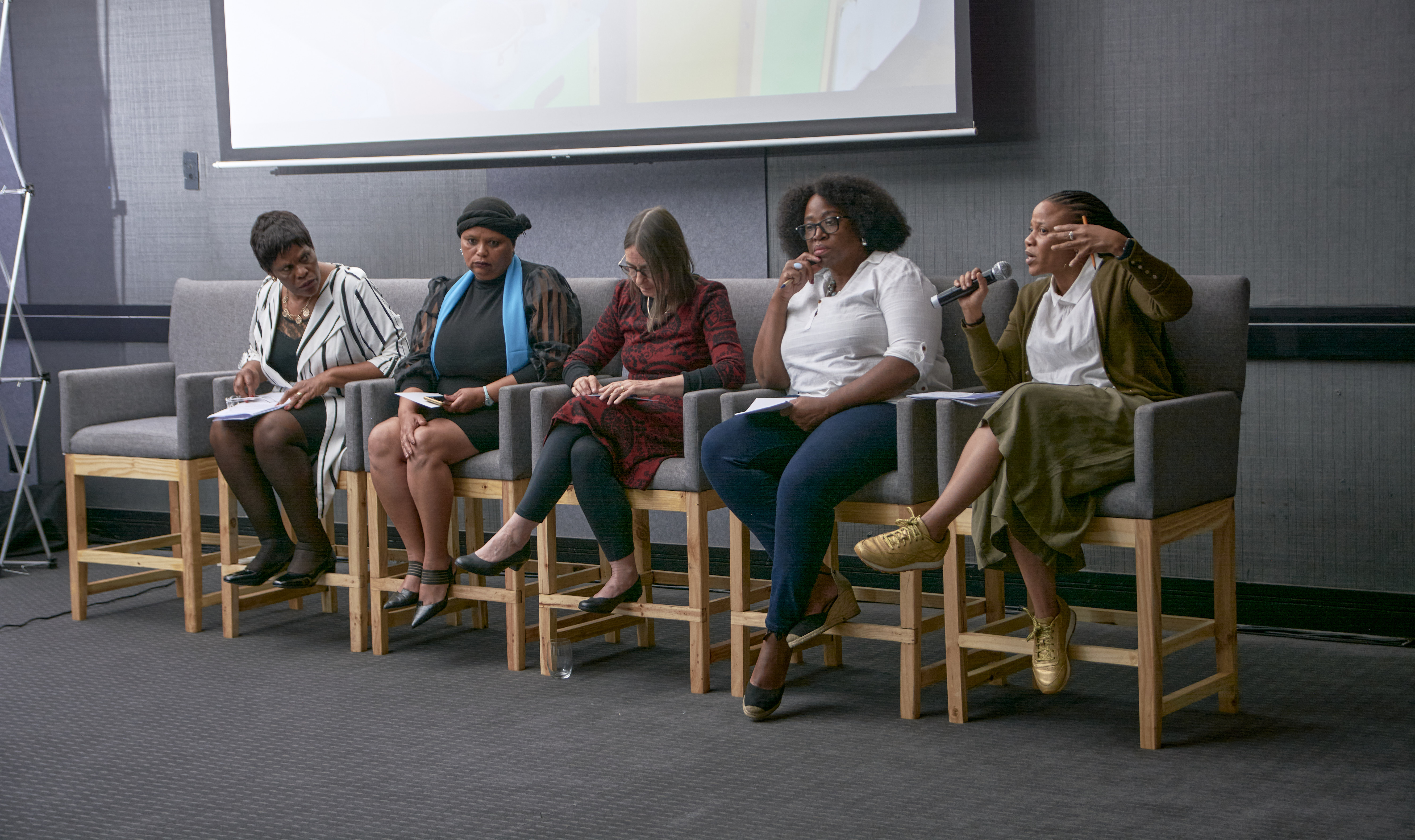 Event highlight image showing speaker and crowd